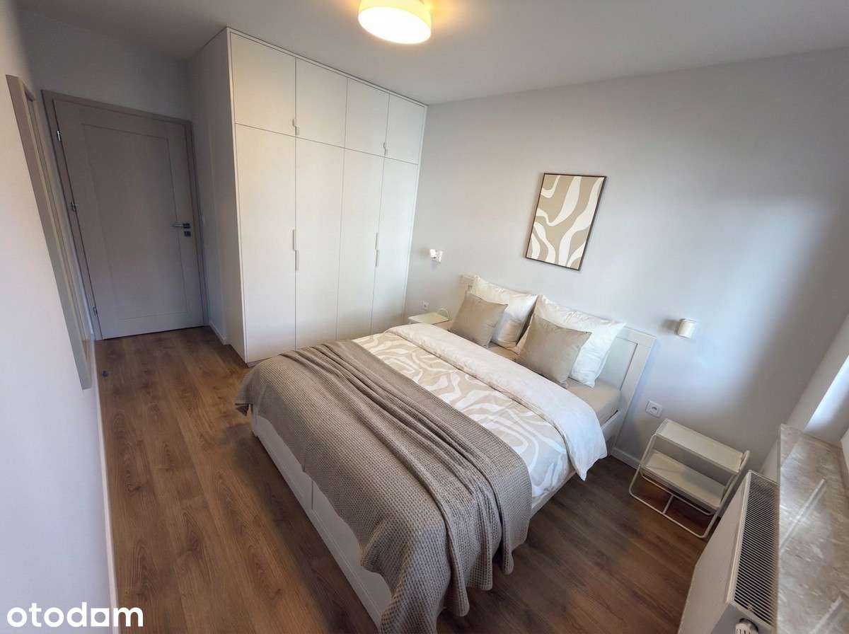 Nowe mieszkanie z balkonem, garażem i komórką lokatorską