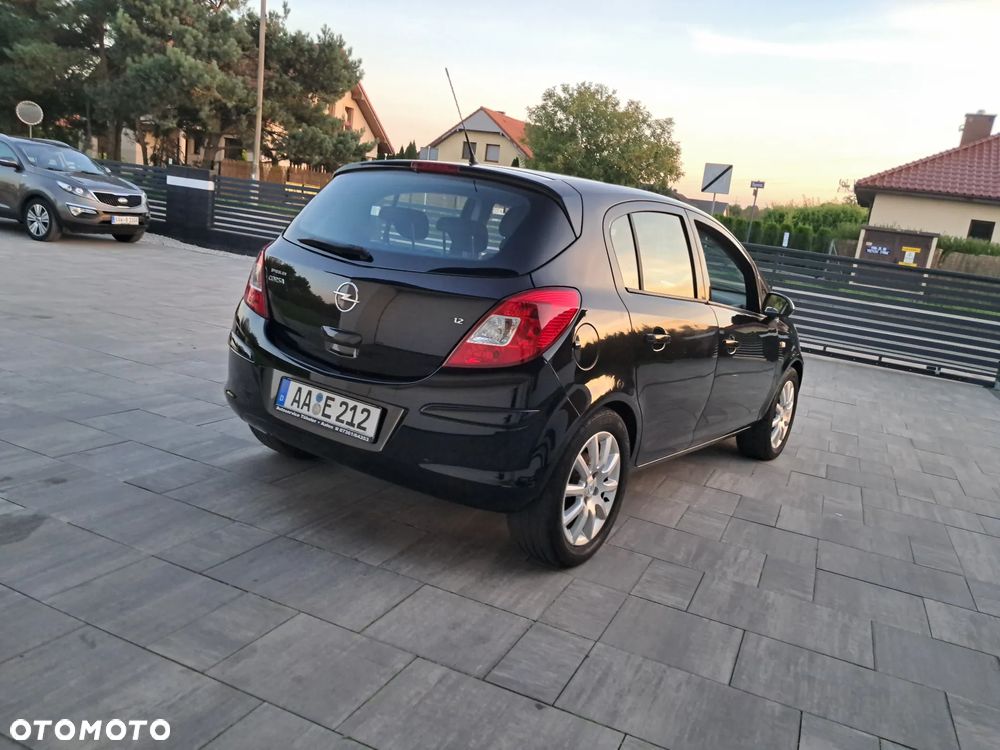 Opel Corsa 1.2 16V Enjoy - 8
