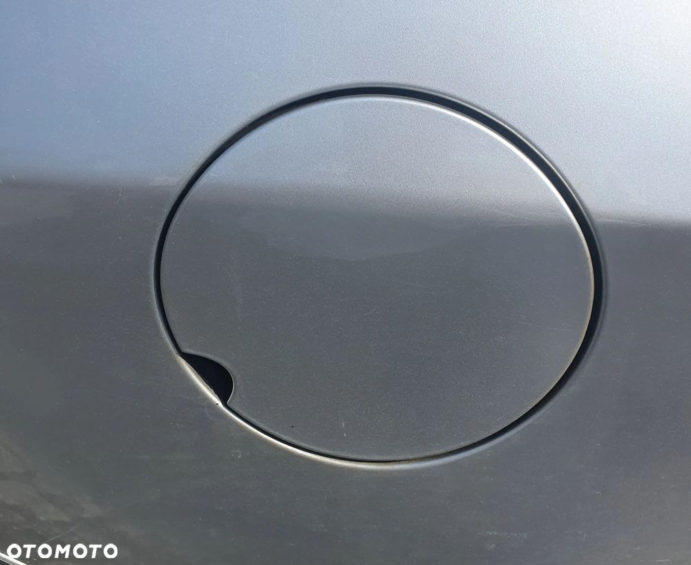 Renault Megane III klapka wlewu paliwa - 1