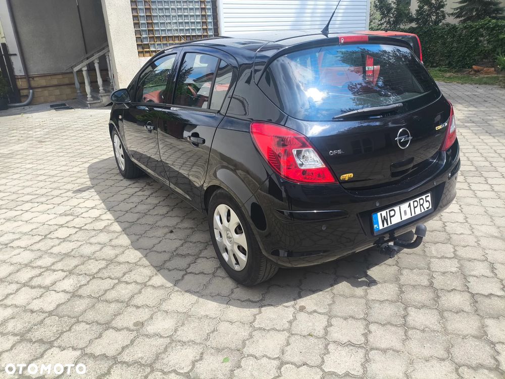 Opel Corsa 1.4 16V Enjoy - 11
