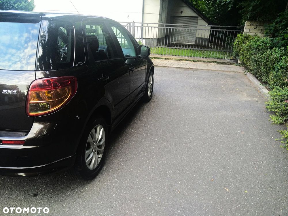 Suzuki SX4 1.6 Comfort Plus - 14