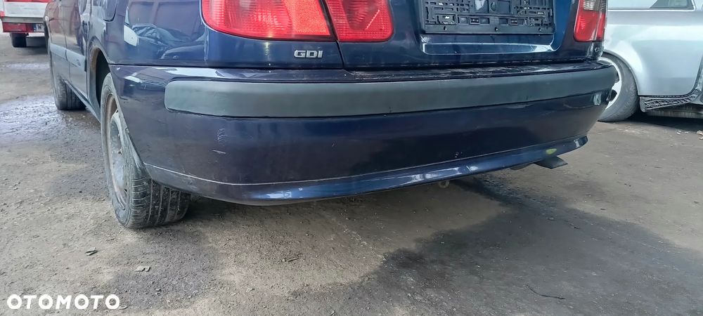 ZDERZAK TYL MITSUBISHI CARISMA 99-04 T46 - 1