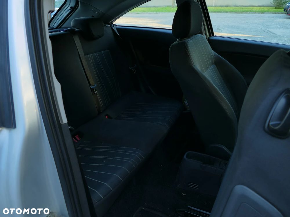 Opel Corsa 1.2 16V Cosmo - 12