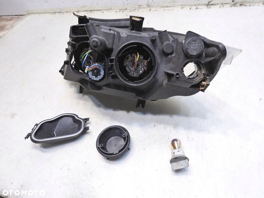 LAMPA PRAWA PRZEDNIA PRZÓD BMW 3 E91 6942748 - 6