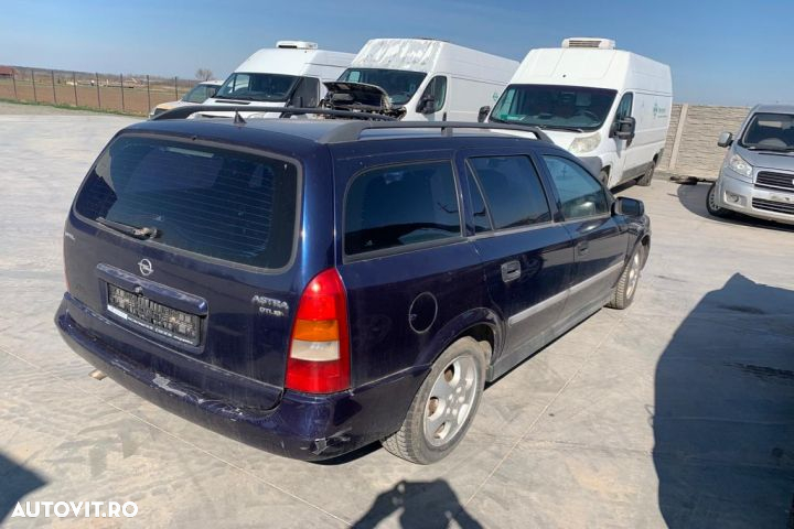 Broasca usa fata stanga 90561151 Opel Astra G  [din 1998 pana  2009] seria wagon 5-usi 2.0 DTI AT ( - 5