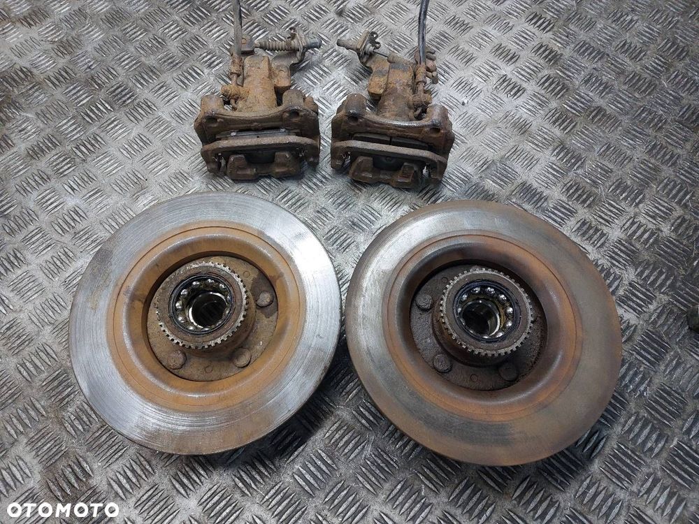 TARCZE HAMULCOWE TYŁ + KLOCKI + ZACISKI PIASTY MAZDA 6 I GG GY - 2