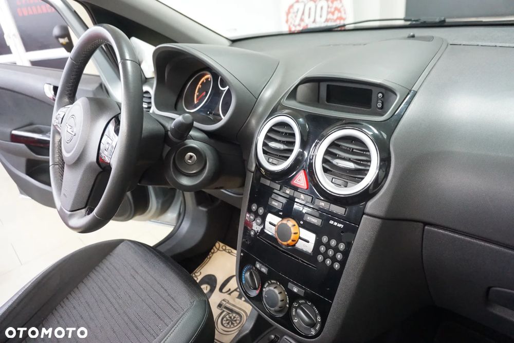 Opel Corsa 1.2 16V Enjoy - 21