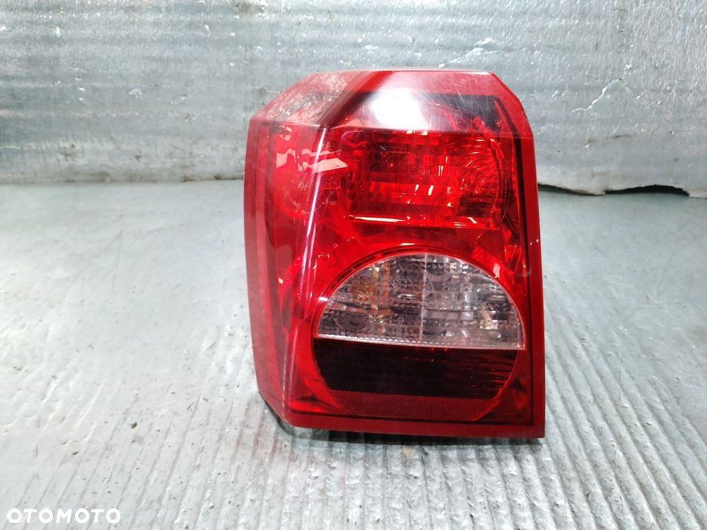LAMPA TYLNA LEWA DODGE CALIBER 320077B  05303753  05303881 - 1