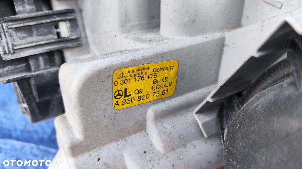 ZDERZAK ATRAPA GRILL BŁOTNIK PRAWY PAS PRZEDNI WZMOCNIENIE CHŁODNICE WENTYLATOR SPRYSKIWACZE LAMPY BI-XENON XENON PRZÓD KOMPLETNY ORYGINALNY LAKIER C946 946 DO ZAŁOŻENIA W KOLOR MERCEDES SL R230 W230 SL500 - 31