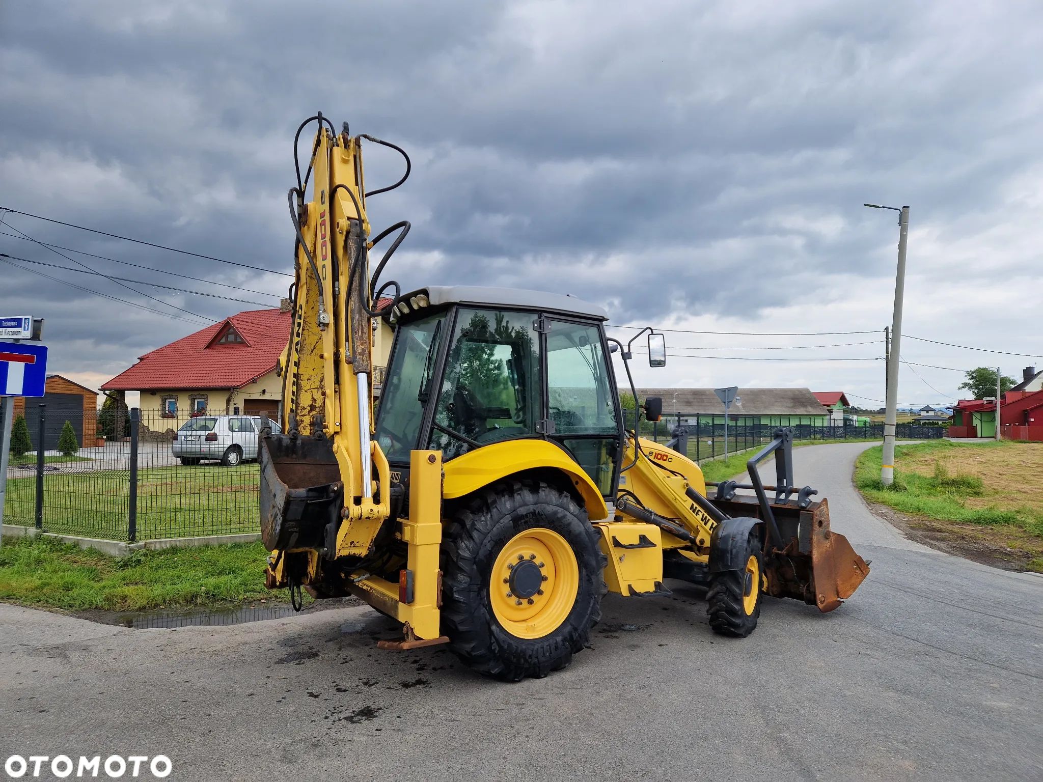 New Holland B100C - 1