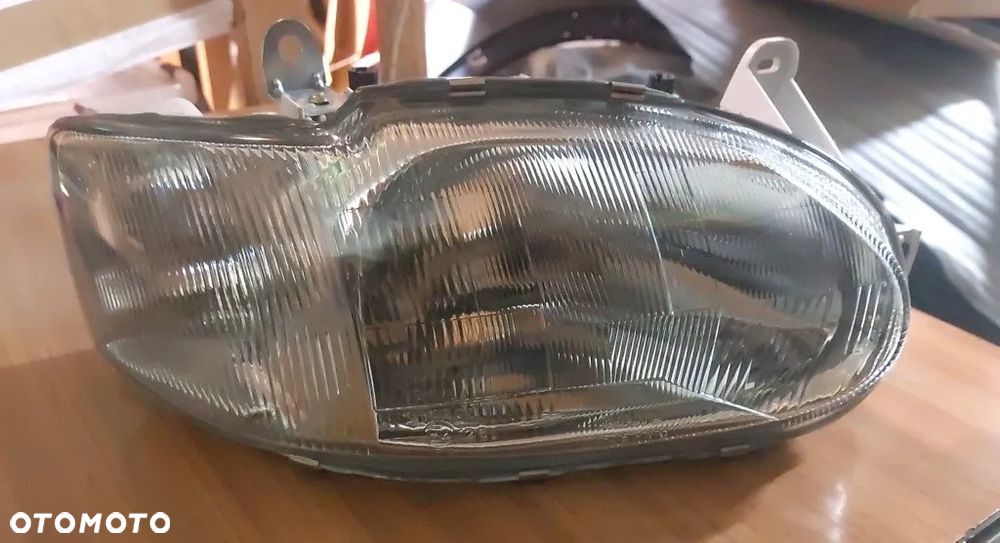 Reflektor prawy pasuje do Ford Escort - 4