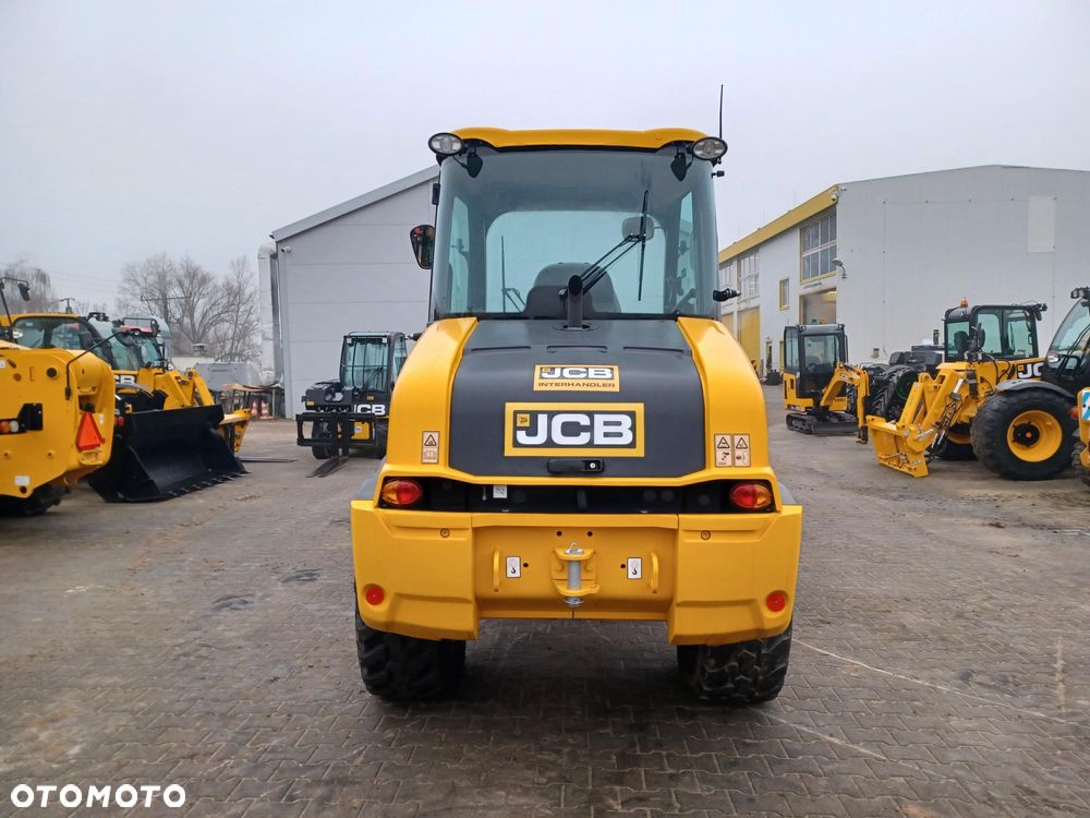 JCB 409 - 13