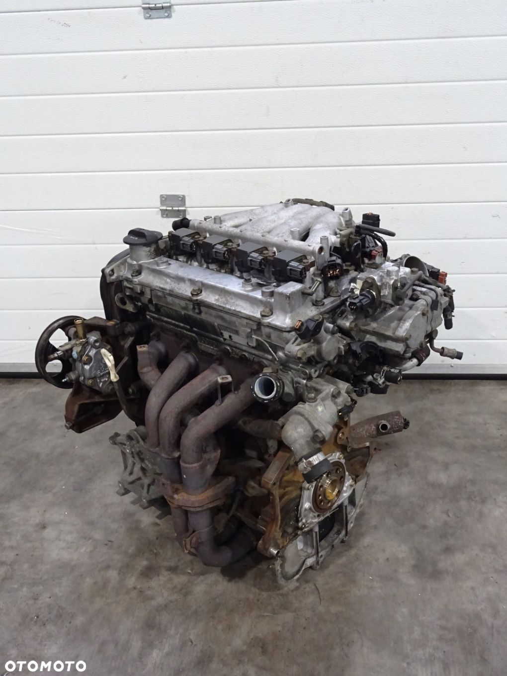 SILNIK KOMPLETNY MITSUBISHI CARISMA 4G93 1.8 GDI - 1