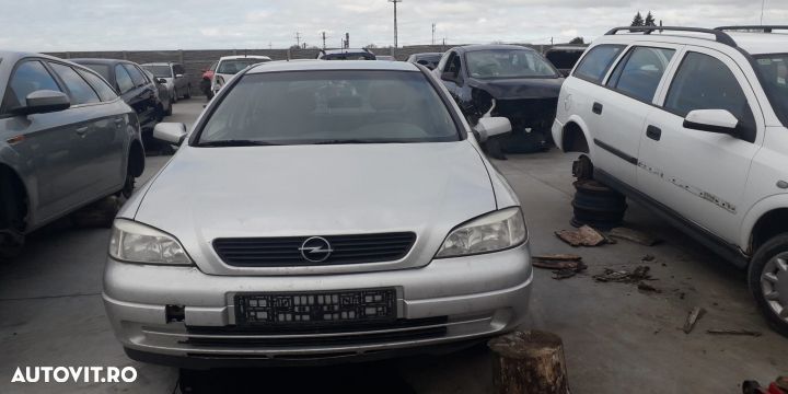 Far stanga Opel Astra G [1998 - 2009] wagon 5-usi 1.7 CDTi MT (80 hp) - 2