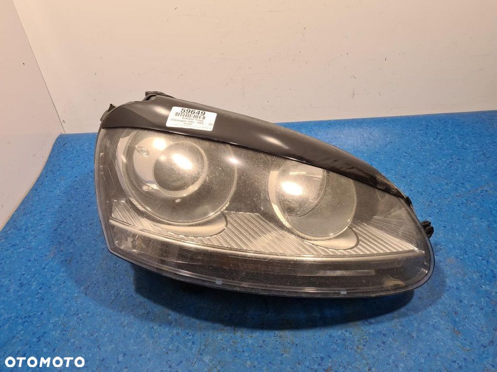 VOLKSWAGEN JETTA V REFLEKTOR PRAWY XENON - 1