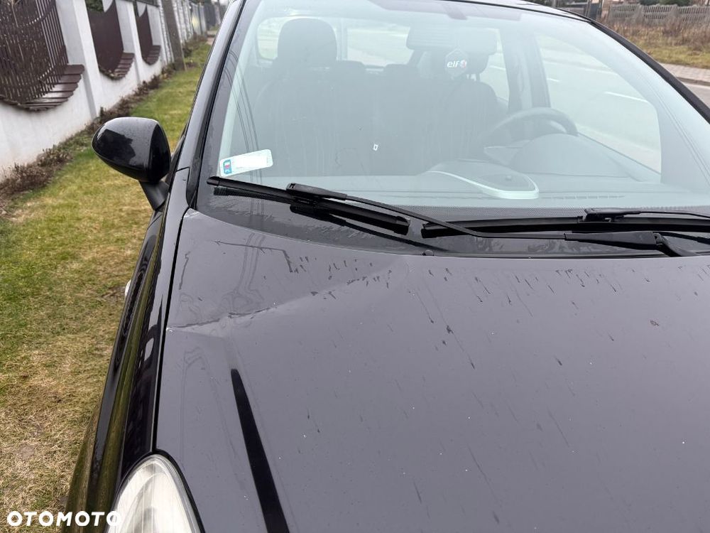 Opel Corsa 1.4 16V Enjoy - 11