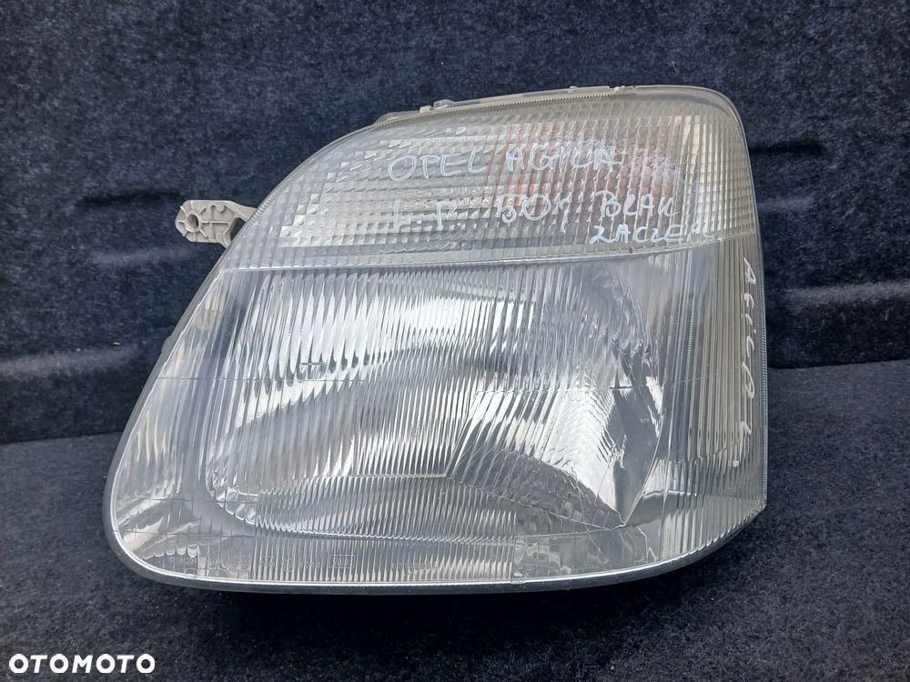 Opel Agila Lampa przednia lewa-Brak jednego dolnego zaczepu. - 1
