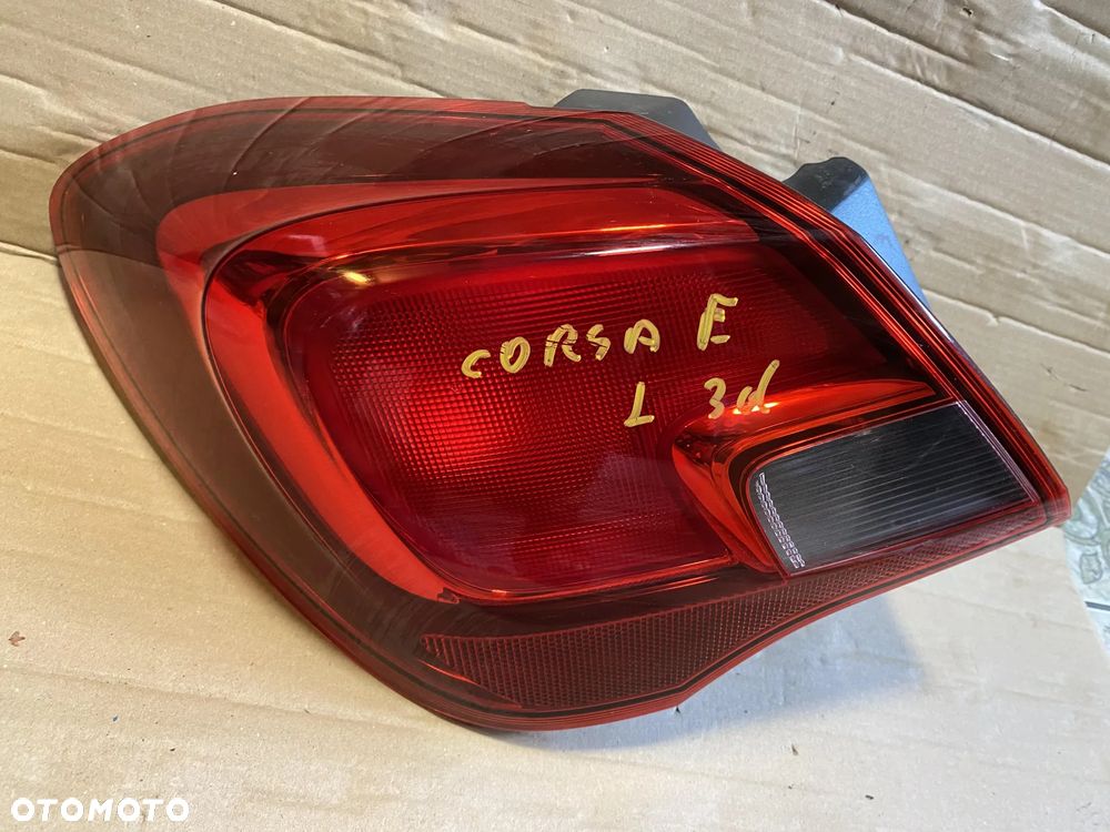 Lampa Opel Corsa E 3d lewa OE - 1