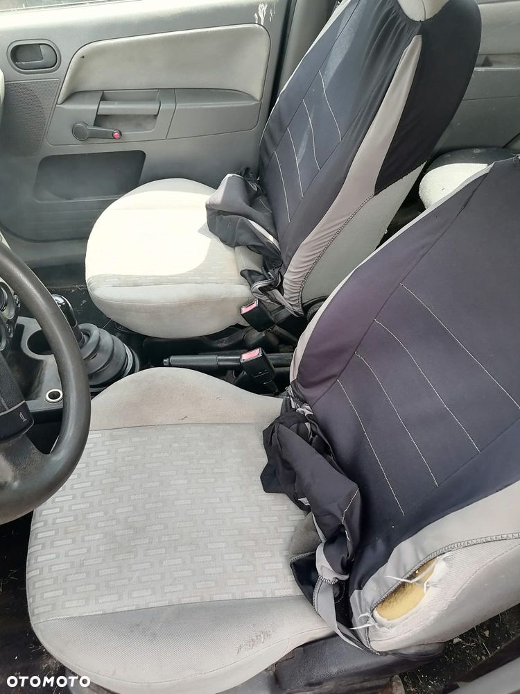 Ford Fusion I (02-05r.) 1.4 TDCI 68KM. Silnik  F6JA, F6JB 7S6Q-6006-AA RM77S6Q-6006-AA Skrzynia 2N1R 7002-PB 2N1R 7002-PD [Przeł. Głów. 3,37] B5/IB5 CIB5 lakier Deep Navy .Cały na części.GWARANCJA !!! Przód Tył Zestaw Komplet Drzwi Klapa Zderzak Błotnik Maska Grill Atrapa Szyba Pas Lampa Lusterko Boczki Fotel Kanapa Kokpit Deska Rozdzielcza Przełącznik Włącznik Sterownik Przewody Wiązka Instalacja Moduł Komputer Czujnik Listwa Pompa Alternator Wtryski Głowica Rozrusznik Kompresor Sprzęgło Dwumas Silnik Skrzynia ABS Klimatyzacji Paliwa Wspomagania Kolektor Turbina Przepustnica Zawór Chłodnica Koło Hak Belka Sanki Zawieszenie Mcpherson Półoś Amortyzator Wydech Tłumik Zacisk Most - 8