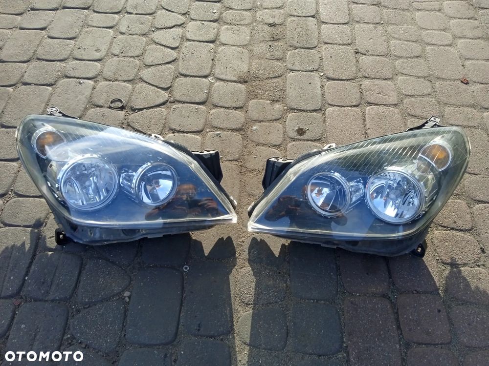REFLEKTOR LEWY LUB PRAWY OPEL ASTRA H III 3 03-07 ORYGINAŁ - 2