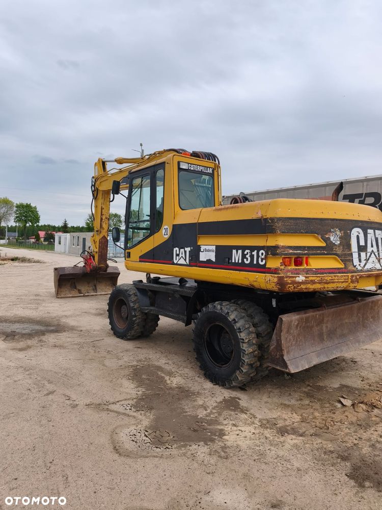 Caterpillar M318 - 4