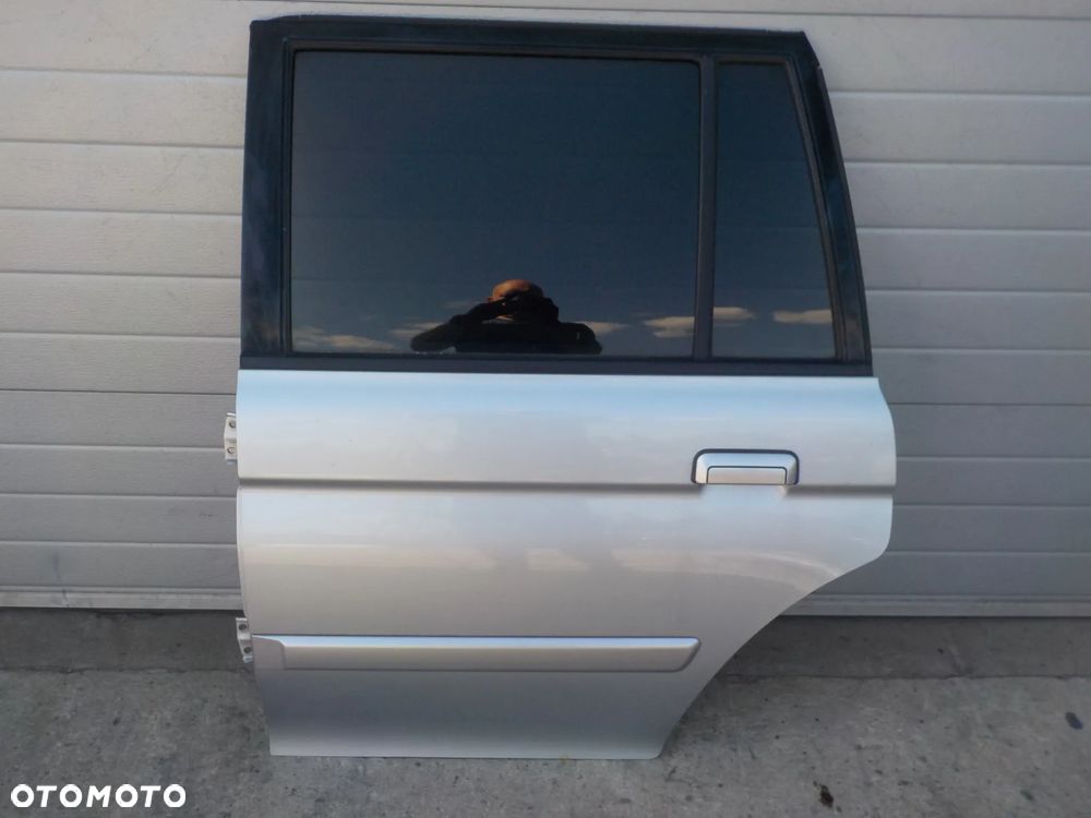 MITUBISHI PAJERO SPORT DRZWI LEWE TYŁ TYLNE - 1