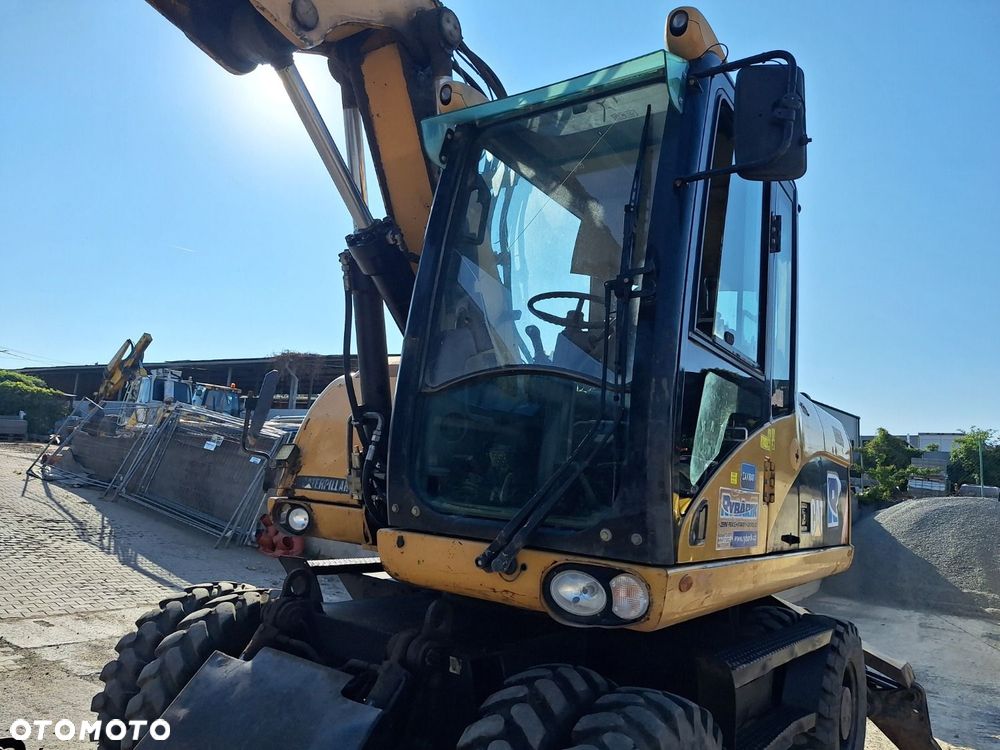 Caterpillar M315D 4X4 - 29