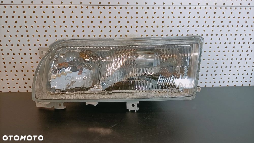 Reflektor lewy Nissan Primera P10 '90-'98