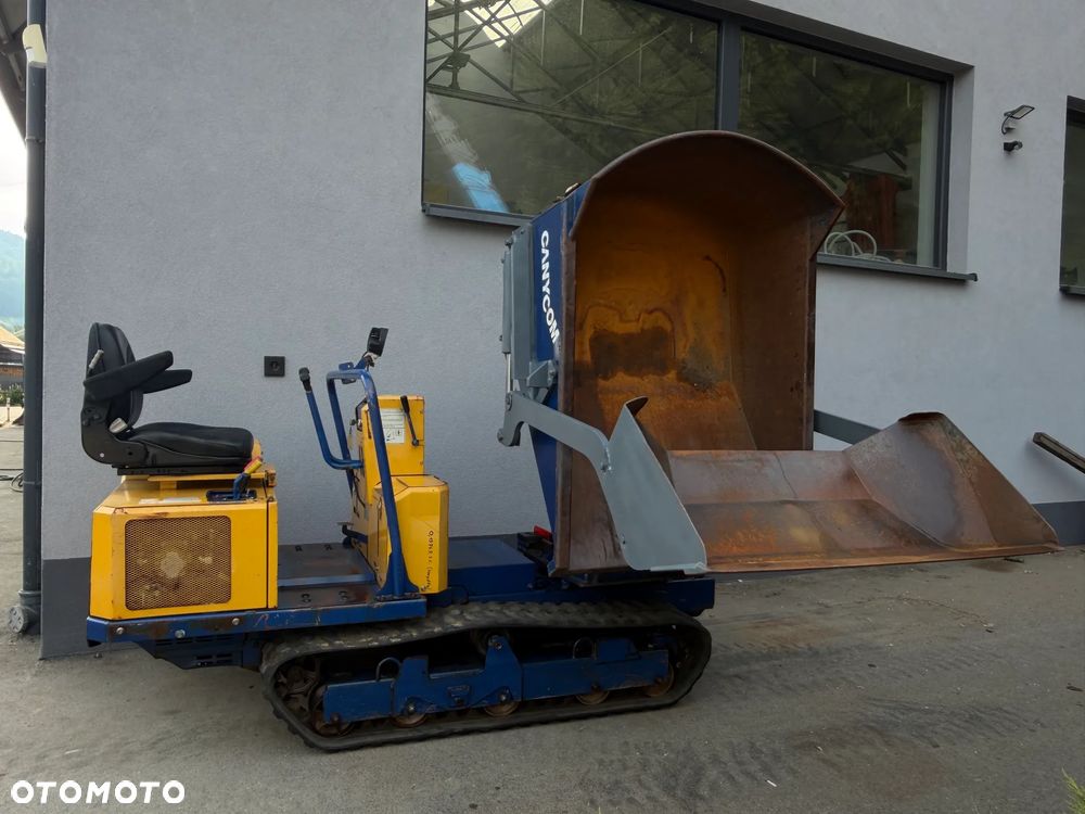 Kubota Canycon S100. Wozidło Gąsienicowe. Japońska Wywrotka w Pełni Hydrauliczna. Samo-załadowcza łyżka. Kiper Obrotowy! Silnik Kubota 3cylindry. Potężna moc. Szybka wolna jazda! Tylko 351 MTG. 2015rok prod. Ani deka luzów czy wycieków! Maszyna Sprowadzona z Norwegii z urzędu komunalnego. Używana raz do roku. Wielka Okazja! - 32