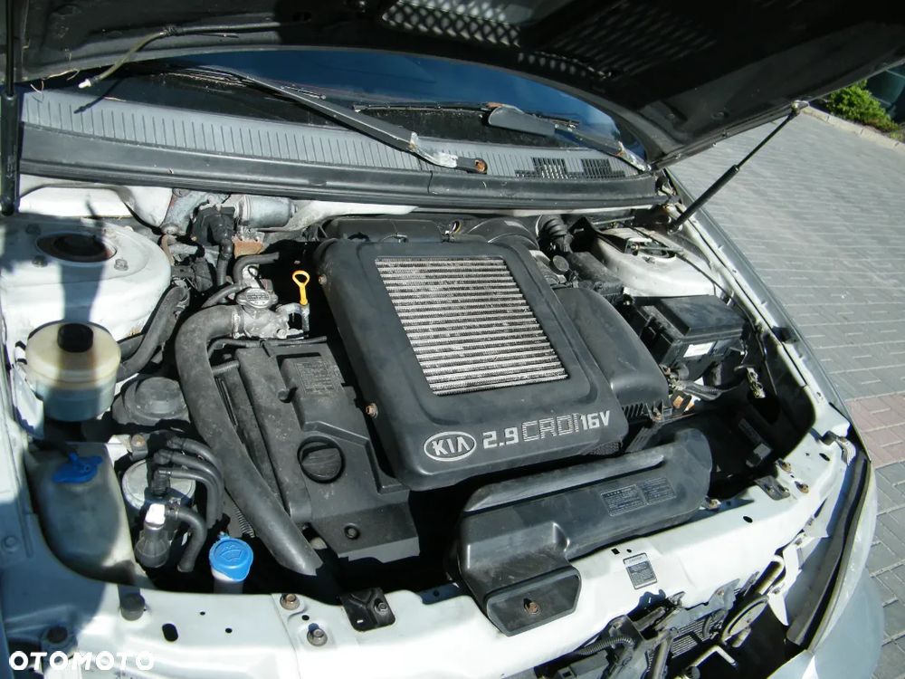 Kia Carnival (01-06r.) 2.9 CRDI 144KM silnik J3 (K0AJ1102 70A) skrzynia LF lakier C5 - DIAMOND SILVER. Cała na części (wszystkie) - 7