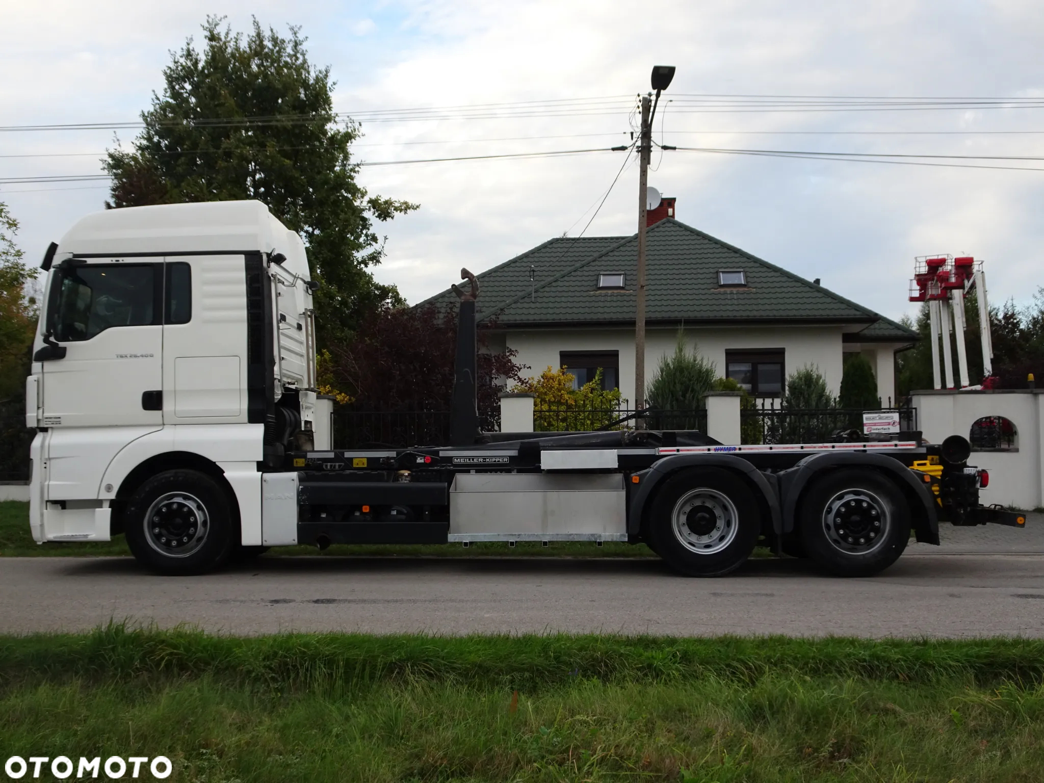 MAN TGS 26.440 6x2 hakowiec Meiller RK 20/70 idealny mały przebieg os skretna - 5