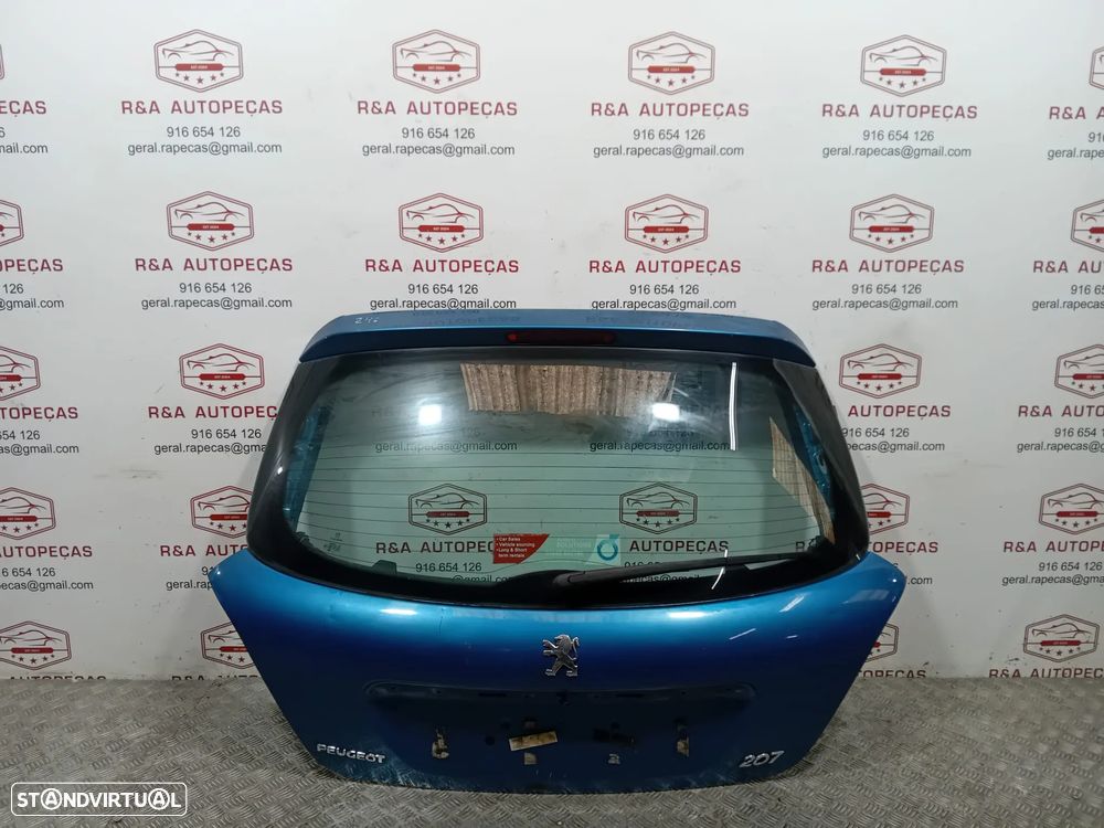 Tampa Porta Mala Peugeot 207 Original - 1