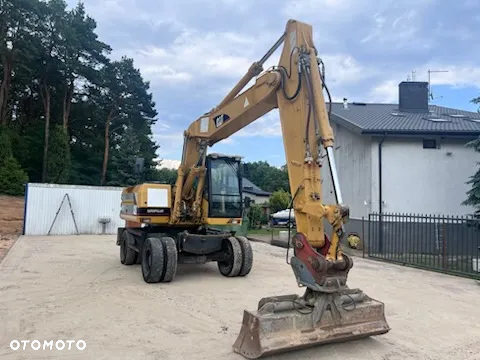 Caterpillar M318 - 9