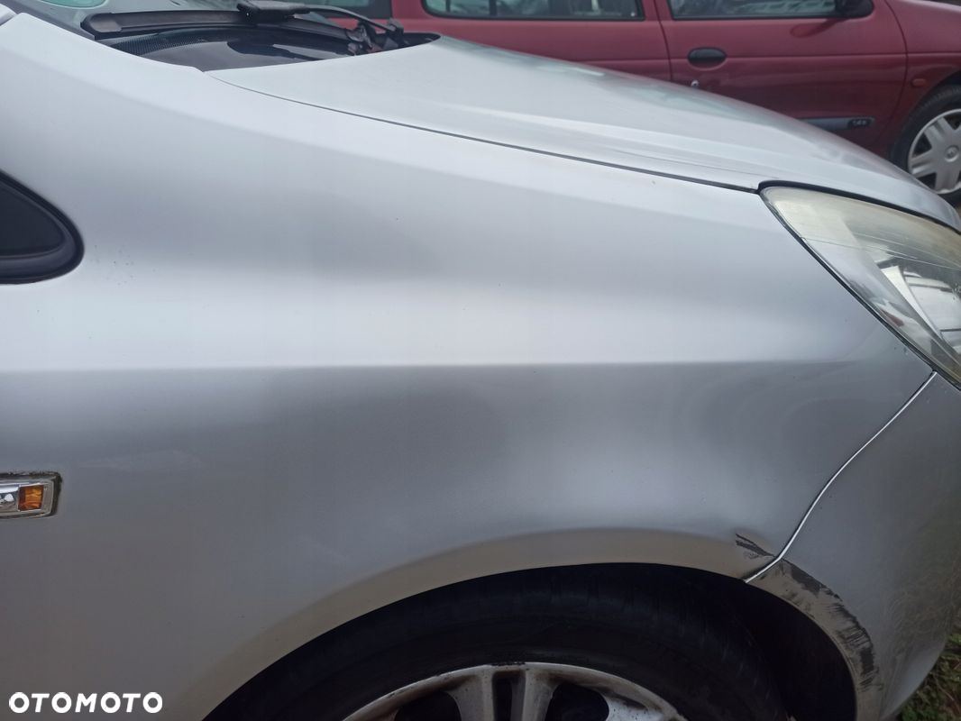 Błotnik prawy przód OPEL CORSA D Z157 06-11 - 3