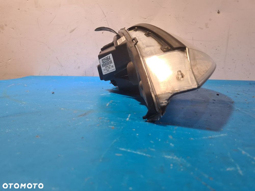 REFLEKTOR LEWY FORD FOCUS MK1 - 4