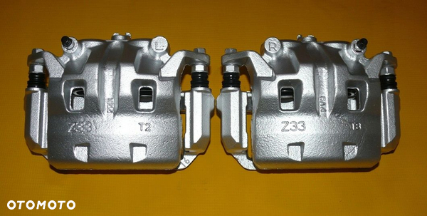 ZACISKI JARZMA LEWY PRAWY PRZÓD NISSAN PATHFINDER III 3 R51 296/28mm 04-10r