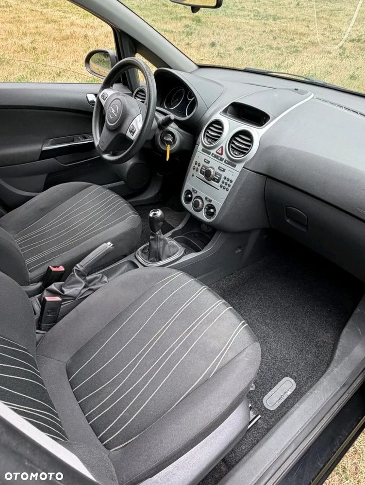 Opel Corsa 1.2 16V Enjoy - 11