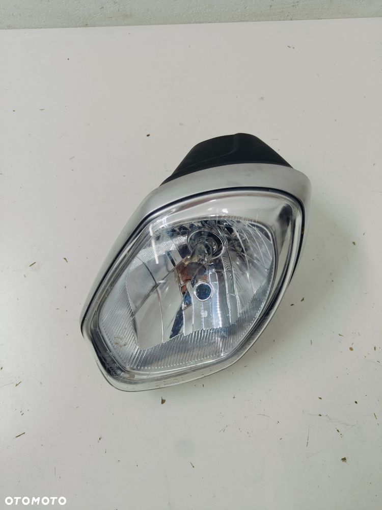 Reflektor Lewy Pęknięty Triumph Speed Triple 1050 - 1