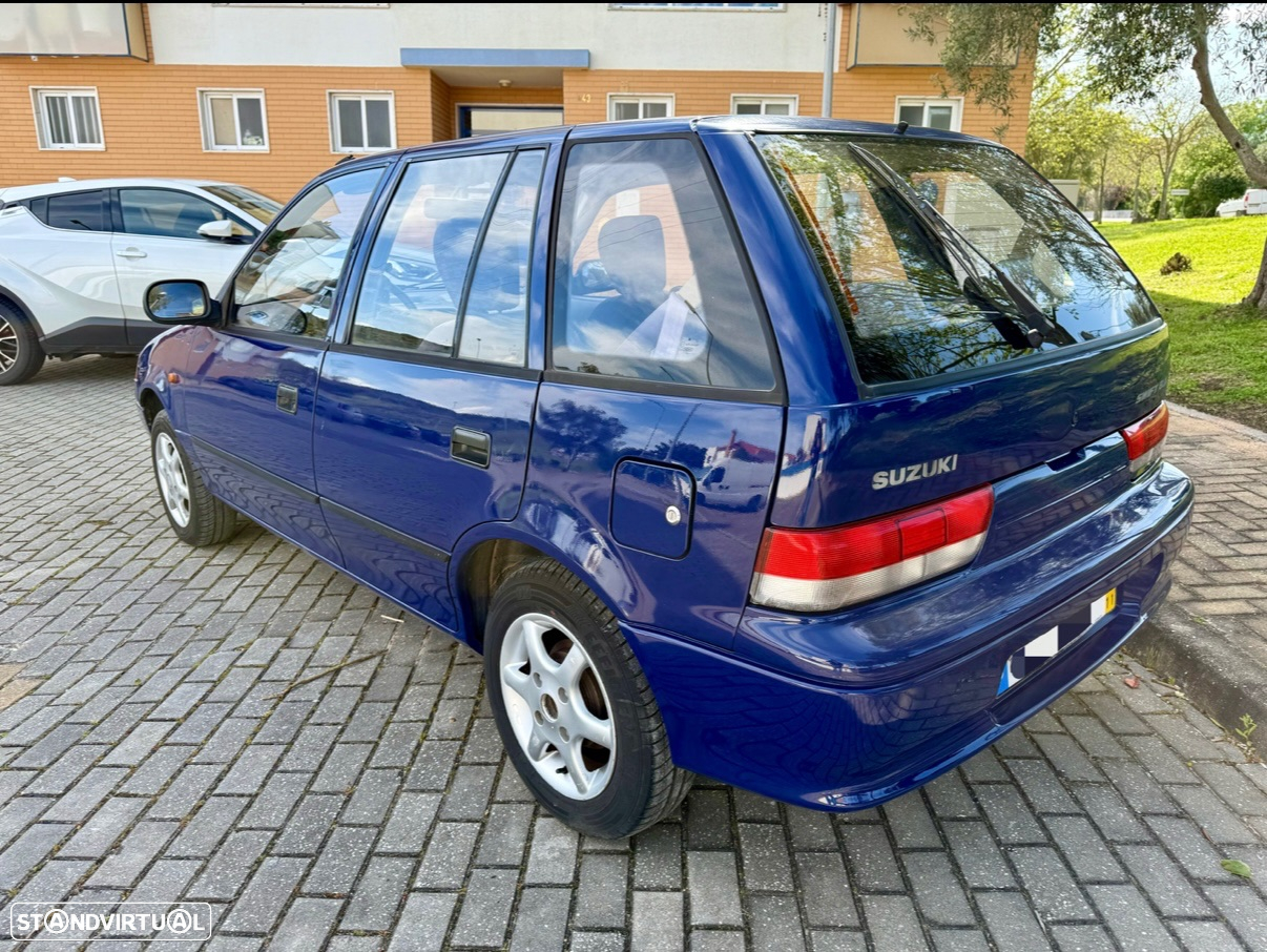 Suzuki Swift 1.0 GLX DA - 8