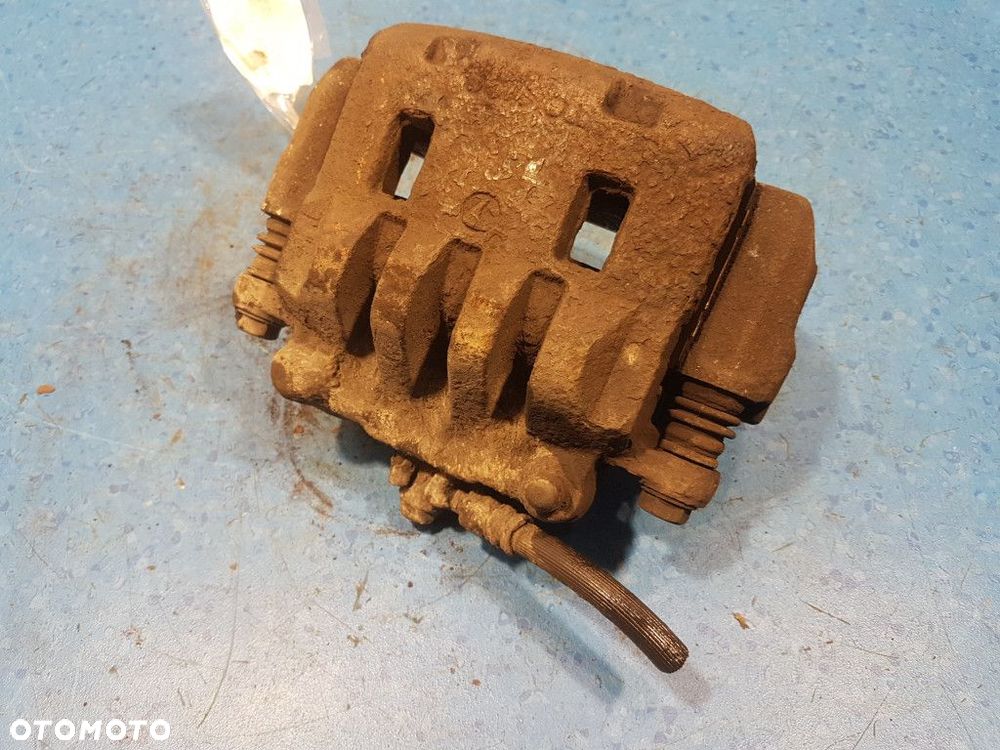 SUBARU FORESTER II 2.0B ZACISK HAMULCOWY PRZÓD LEWY - 12