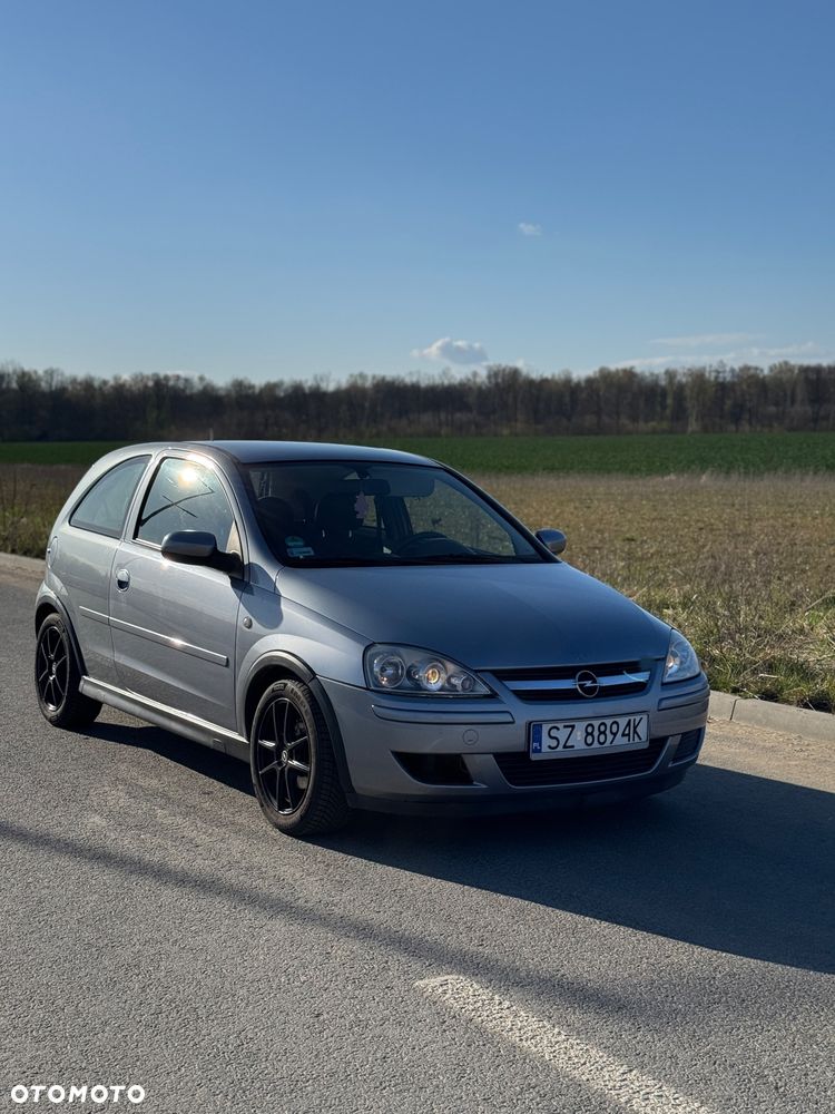 Opel Corsa 1.0 12V Cosmo - 1