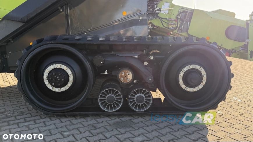 Claas Lexion 770 Terra Trac wyposażony w Header Vario 1230 12,27m - 14