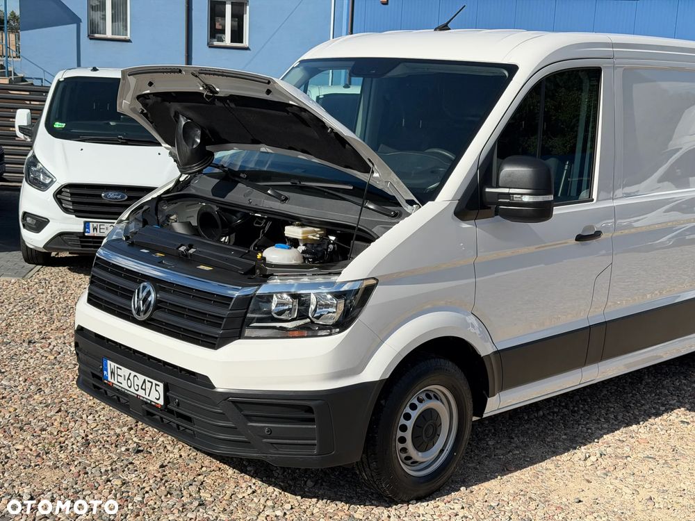 Volkswagen CRAFTER VAN VAT-1 z ZABUDOWĄ SERWISOWĄ WARSZTAT StoreVAN Półki, Szuflady, Kuwety na drobne przedmioty, Masaż fotela kierowcy, Fotel pneumatyczny terapeutyczny pilot ergoActive, Podgrzewana szyba, Kierownica wielofunkcyjna, Tempomat, Ogr. prędkości, Minibar, Fabrycne parktroniki przód i tył, DMC:3500kg, Homologacja haka 3000kg! Duża ładowność 1315kg Model L2H1 Paka dł. 3450mm - 13