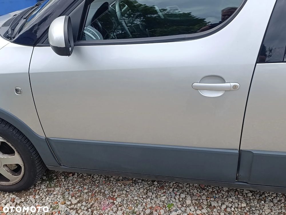 Skoda Roomster 1.4 TDI Scout - 12
