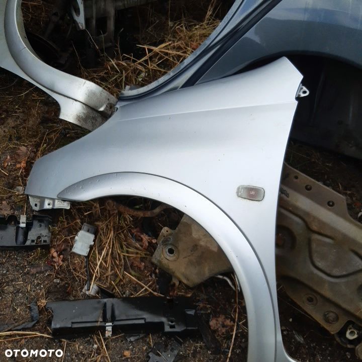 ZDERZAK PRZEDNI LEWY VERSO - 1