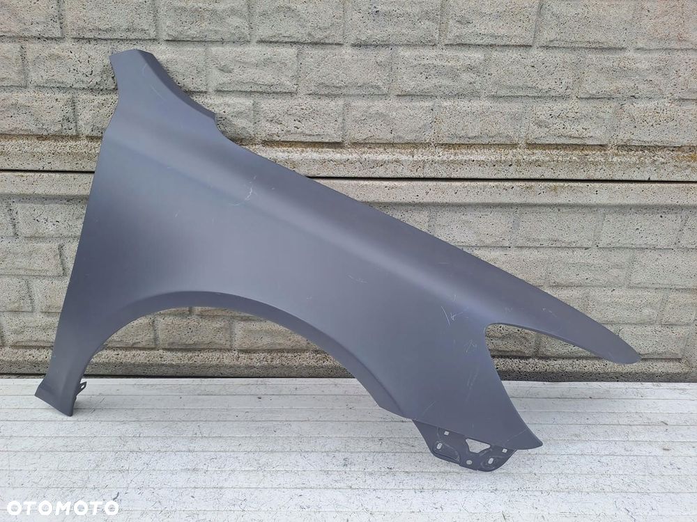 skoda octavia ii 2 lift 08-13 błotnik prawy przód oryginał - 1