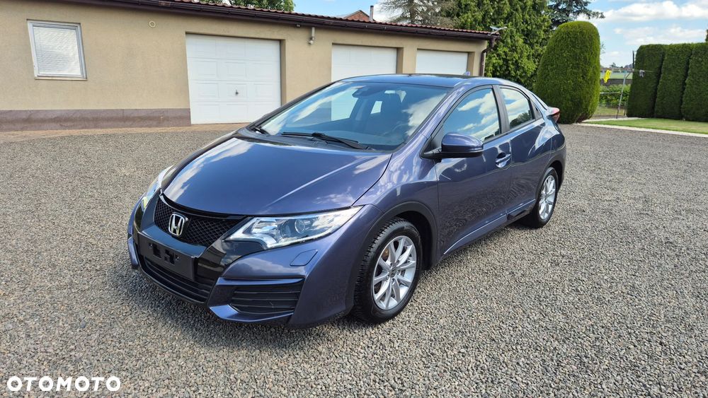 Honda Civic 1.4 i-VTEC Comfort - 1