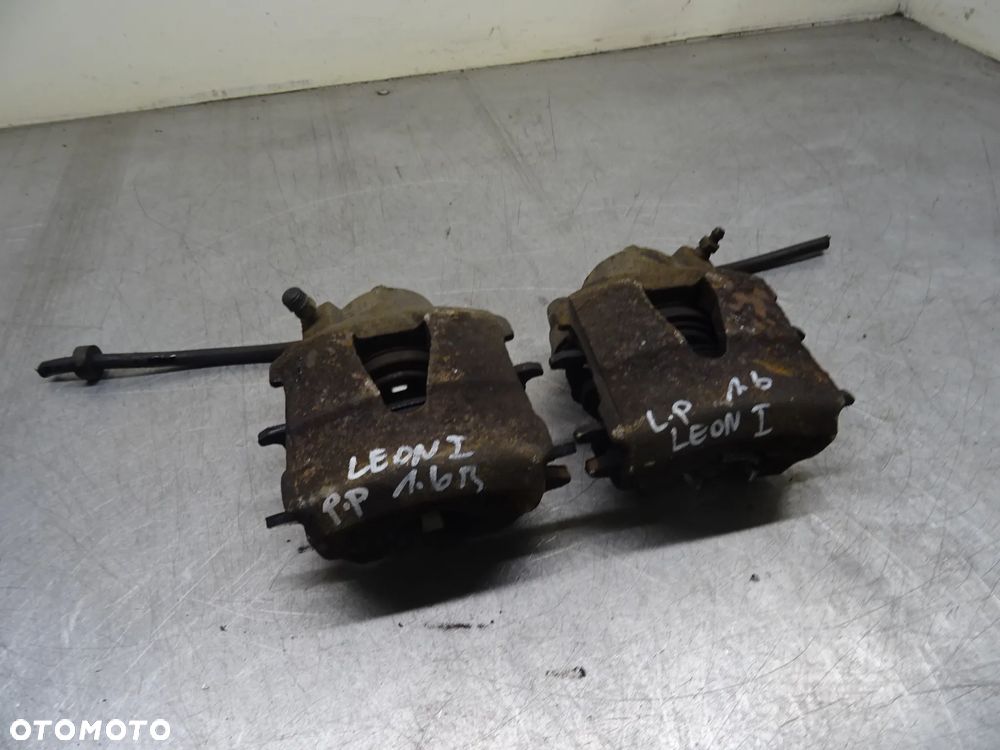 SEAT LEON I 1.6B ZACISK PRAWY LEWY PRZÓD PRZEDNI - 1