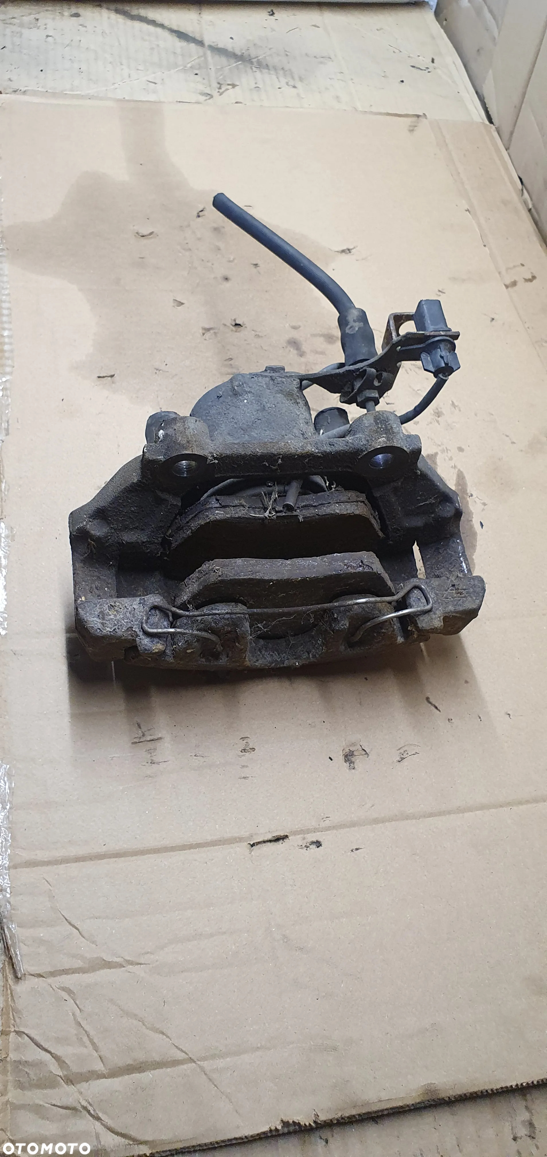 Zacisk hamulcowy lewy przód przedni VW Passat B5 - 5