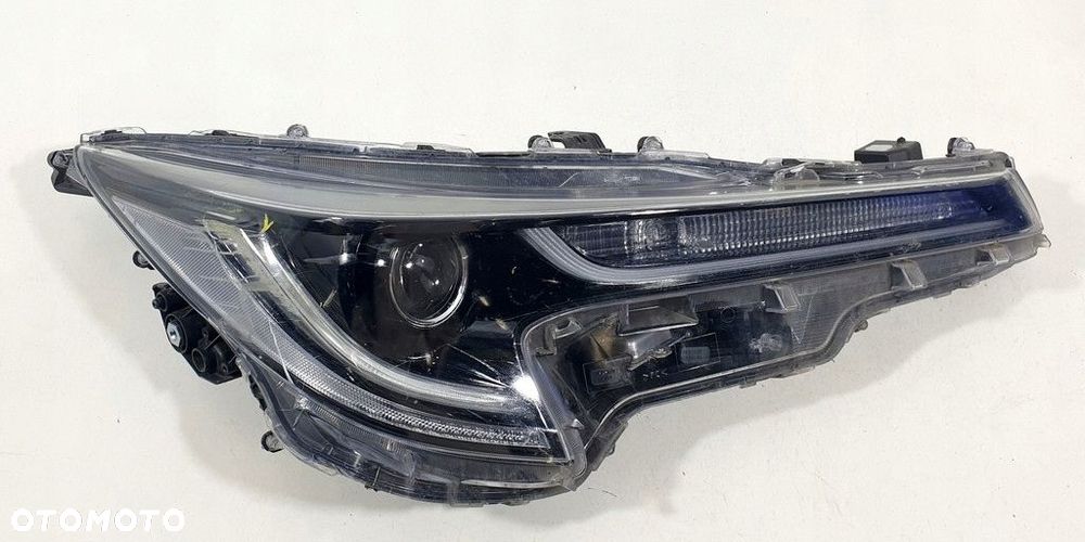 Toyota Corolla E21 Reflektor Prawy 90119225 - 1